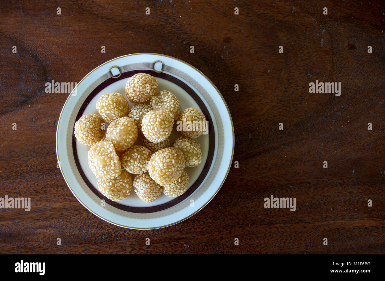 Onde-onde goreng pastry snack in Indonesia on plate with copy space right Stock Photo