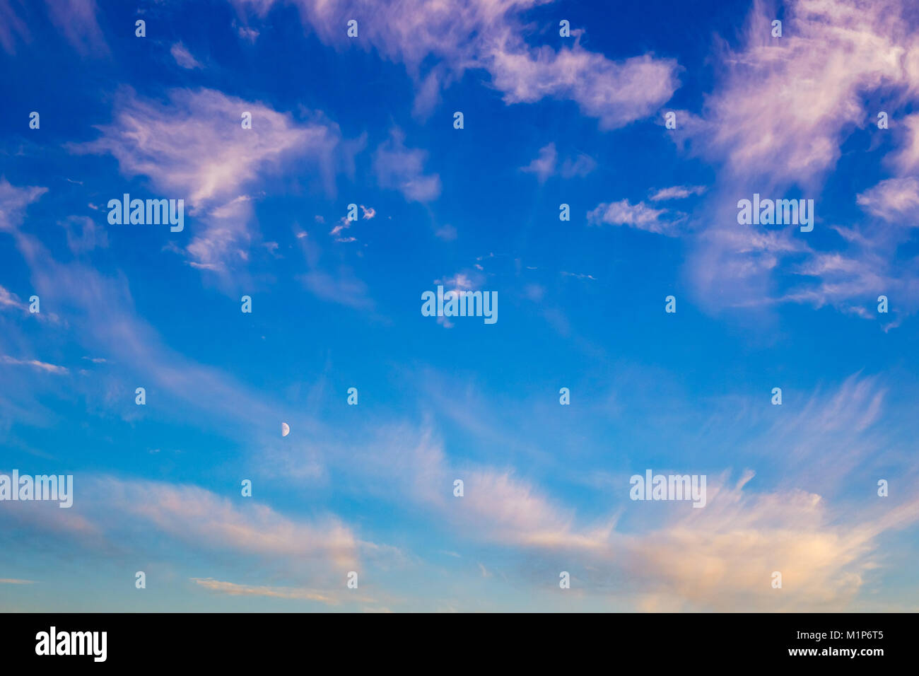 Evening blue sky background with beautiful clouds Stock Photo - Alamy