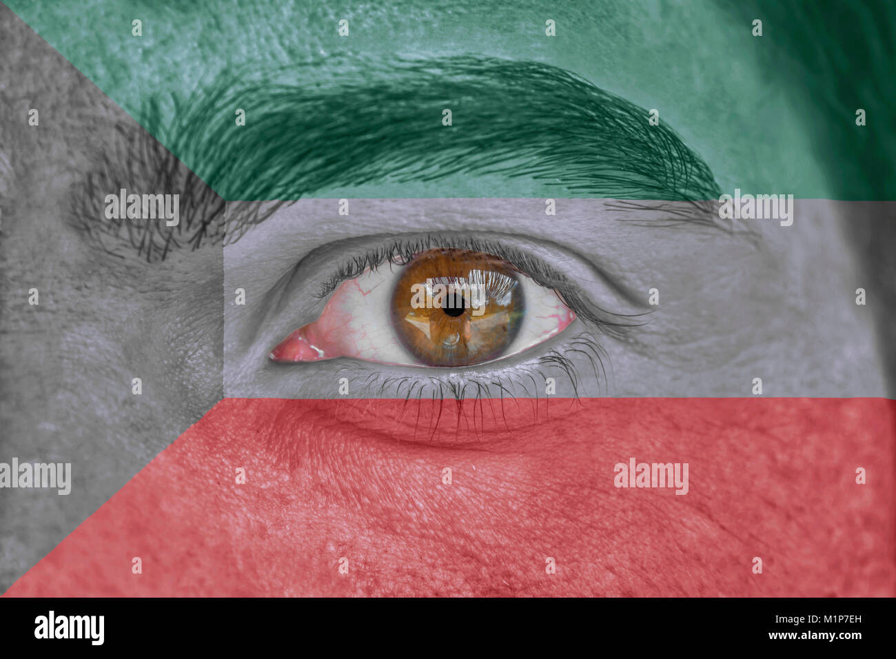 Human face and eye painted with flag of Kuwait Stock Photo Alamy
