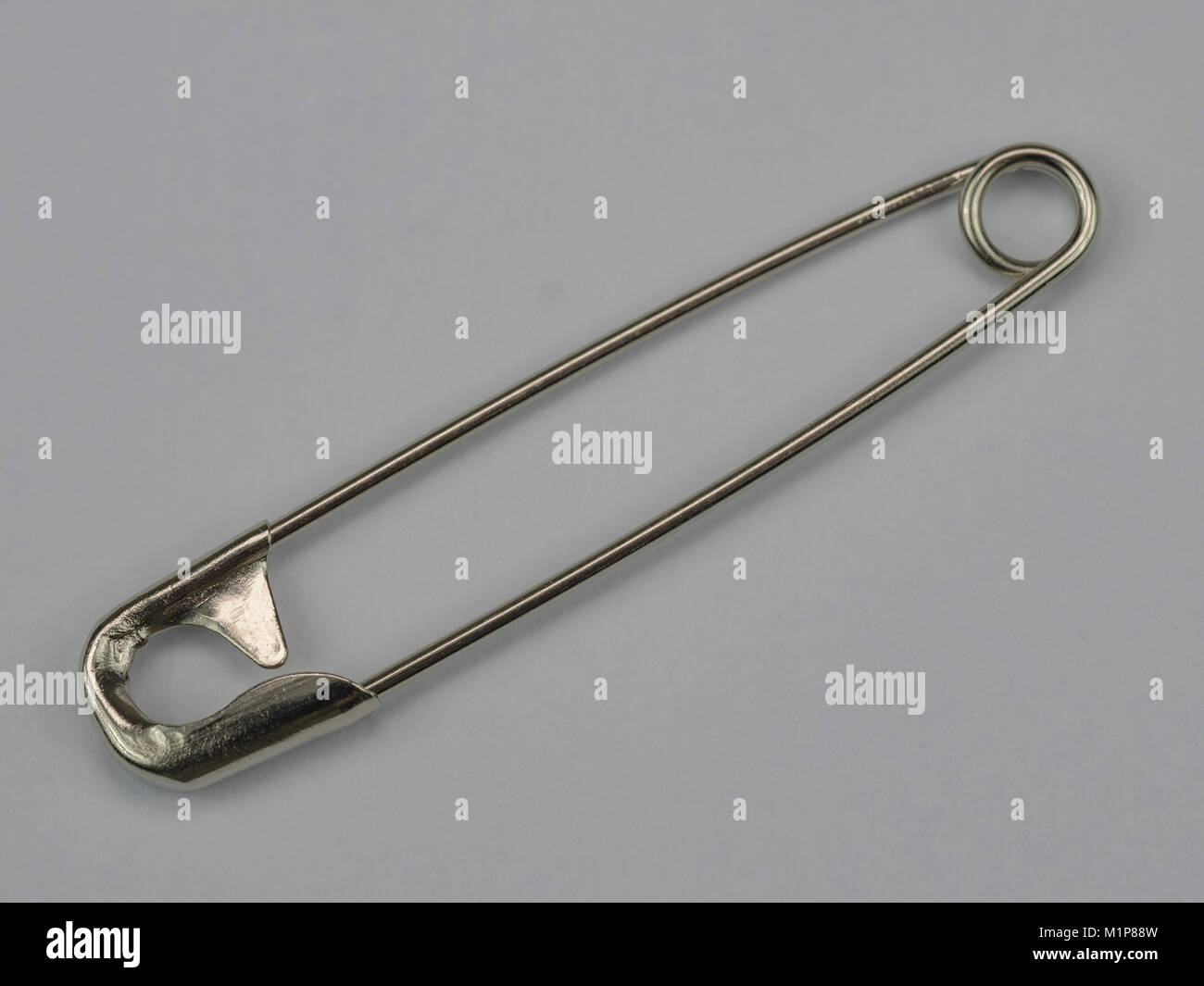 Safety pin clothing hi-res stock photography and images - Alamy