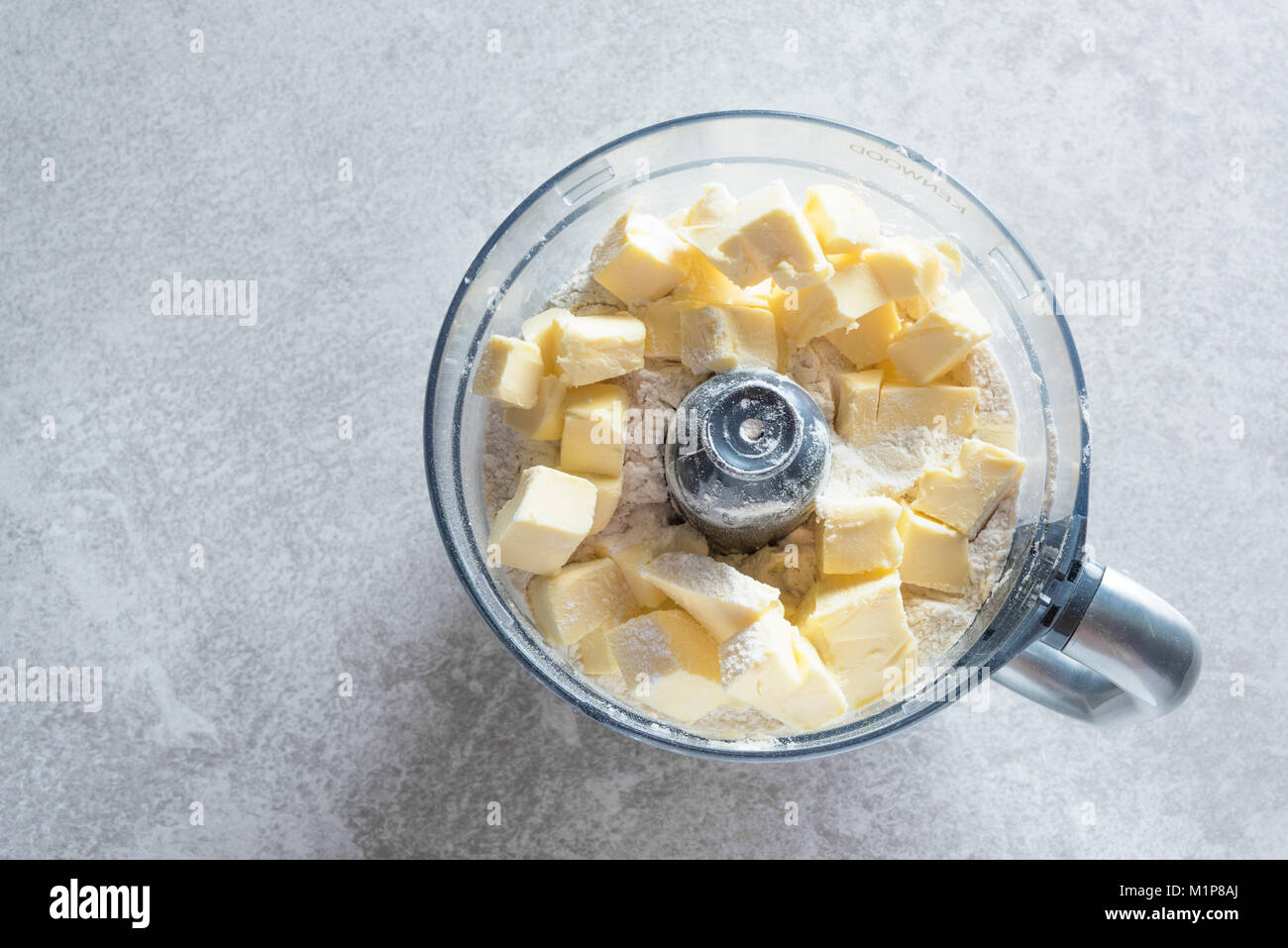 Dough prepaing in a food processor. Batter making fast and easy Stock