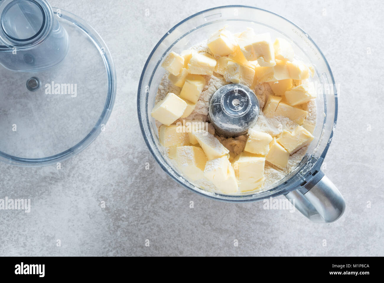 Dough prepaing in a food processor. Batter making fast and easy Stock