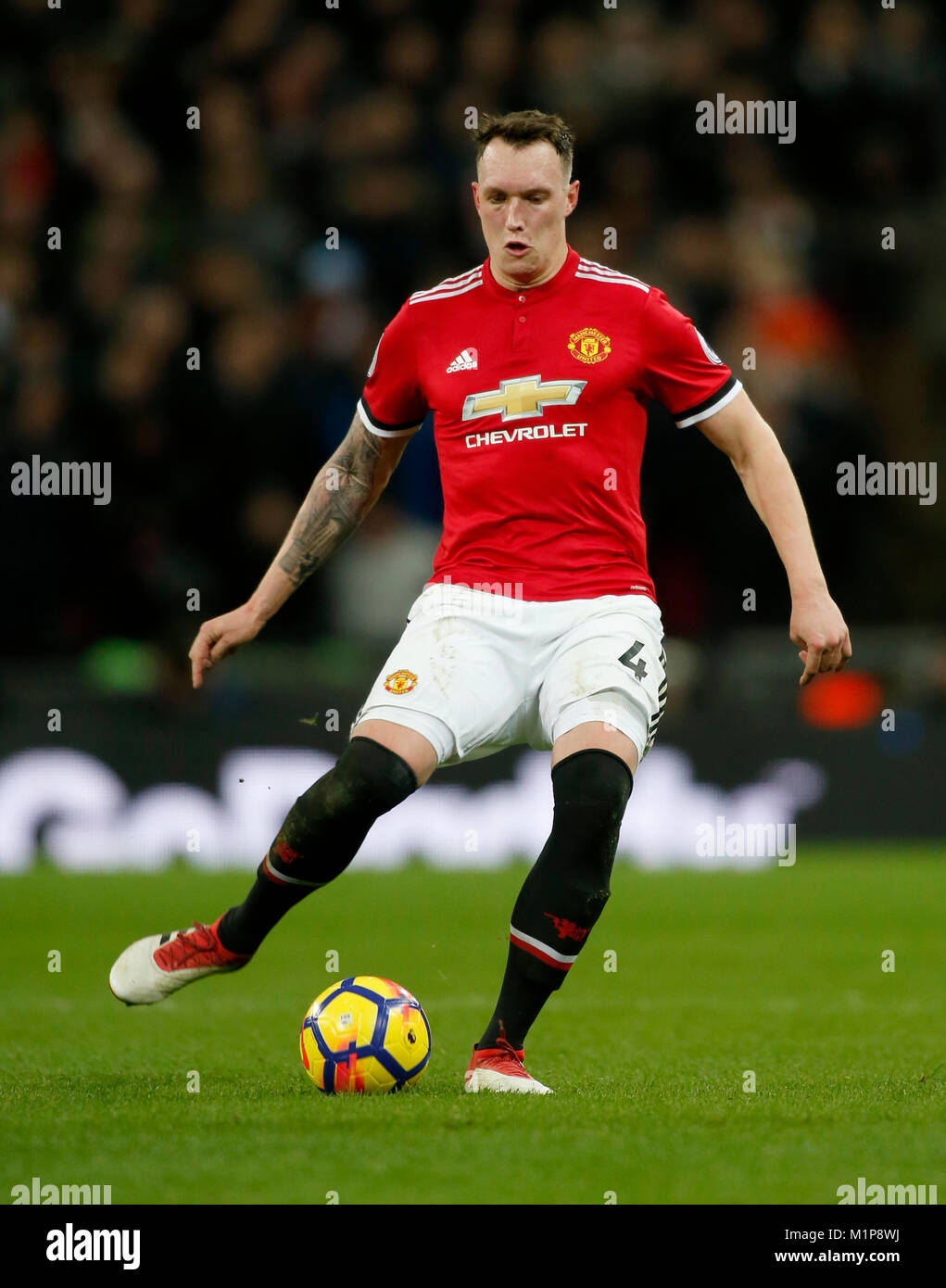 Phil Jones of Manchester United in action versus Tottenham Hotspur played at Wembley Stadium on 31st January 2018 Stock Photo