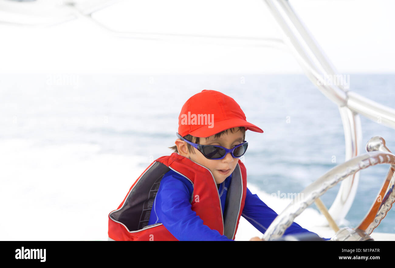 Driving a boat hi-res stock photography and images - Alamy