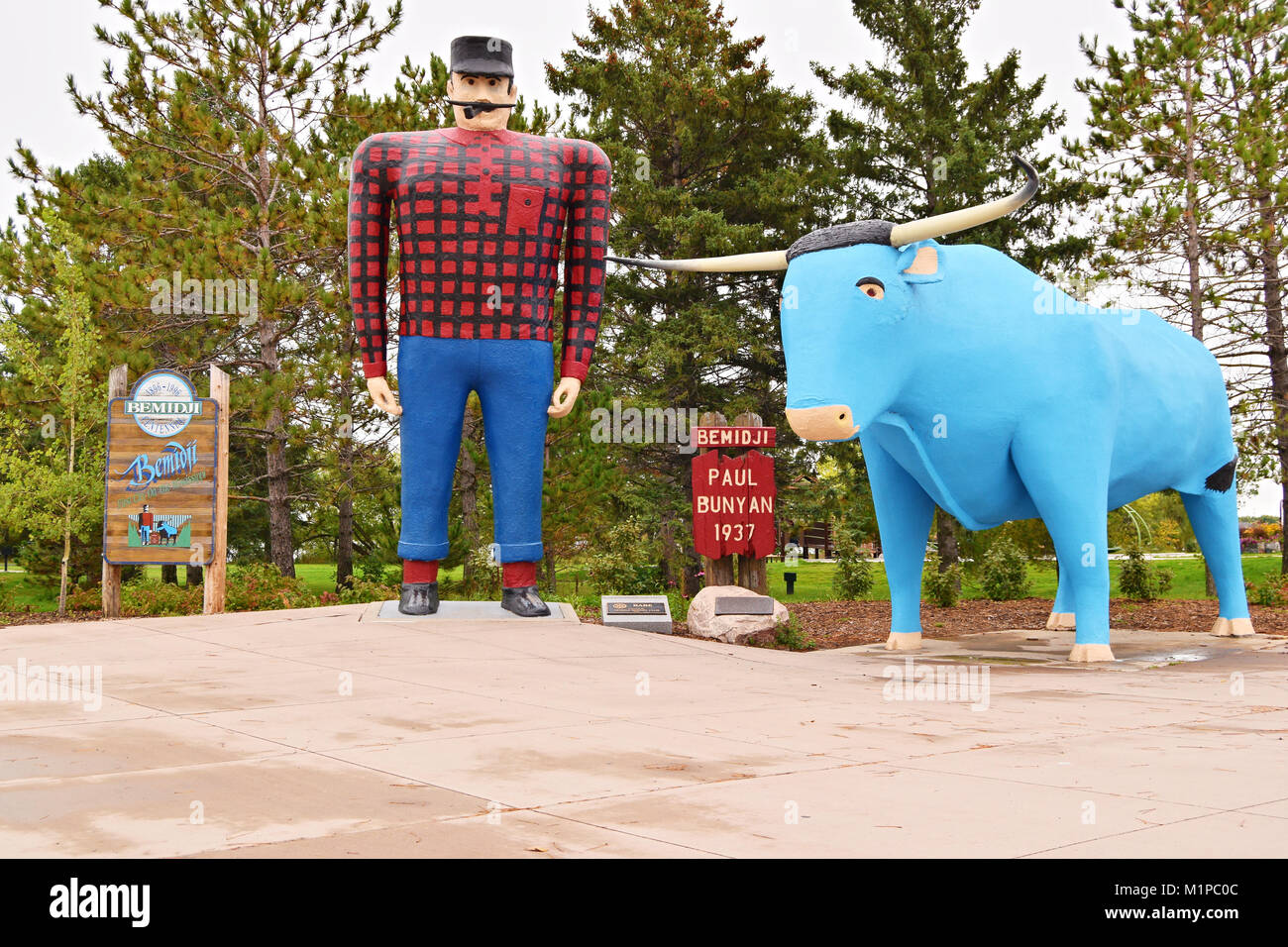 Statue of Paul Bunyan, Legendary Lumberjack and Babe The Blue Ox in Bemidji, MN. United States Stock Photo
