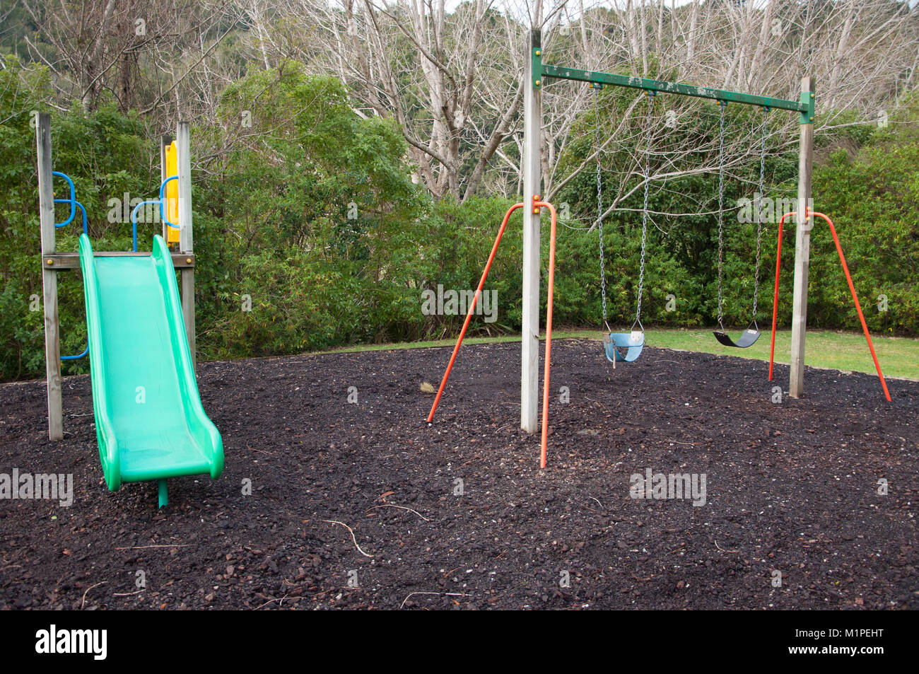 Playground Slide And Swings Stock Photo Alamy