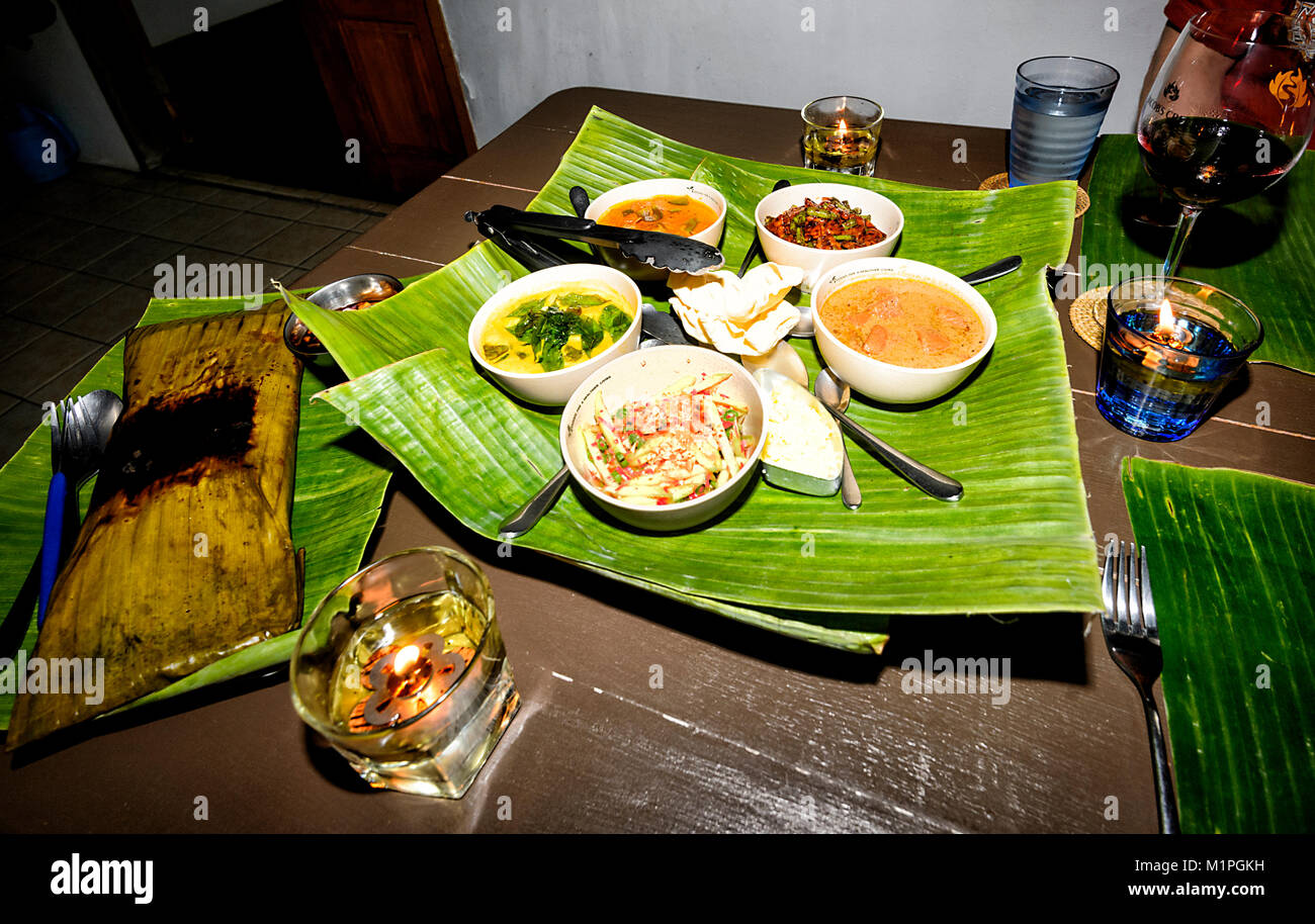 Various Malaysian dishes in bowls presented on a banana leaf, Sabah, Borneo, Malaysia Stock Photo