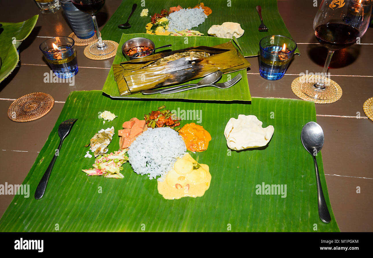 Various Malaysian dishes served on a banana leaf, Sabah, Borneo, Malaysia Stock Photo