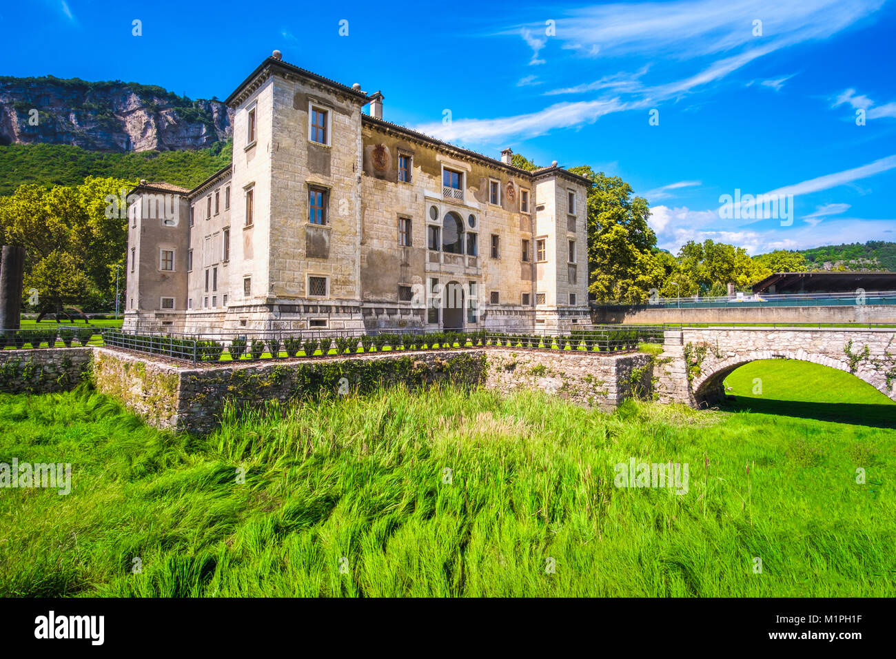 castle moat fosse dry grass Albere palace in Trento Trentino Italy Stock Photo