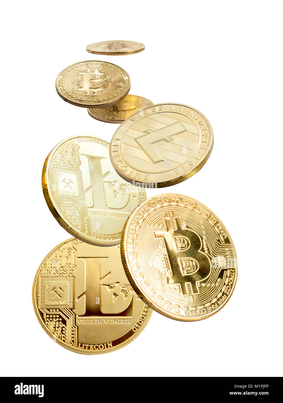 On a white background are gold coins of a digital crypto  currency - litecoins, bitcoin and ethereum Stock Photo