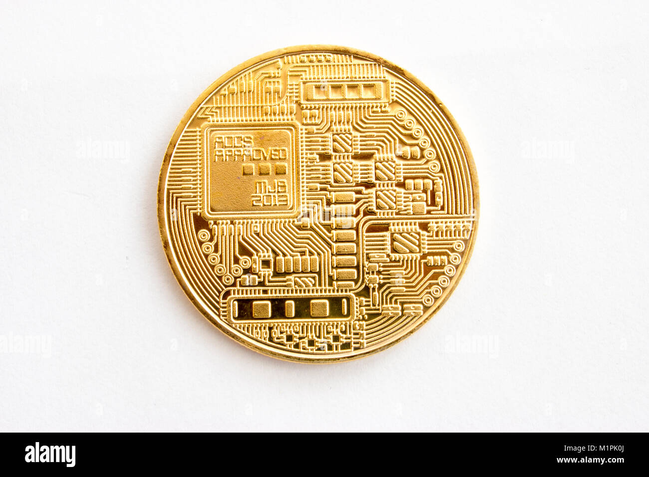 On a gray background is gold coin of a digital crypto currency