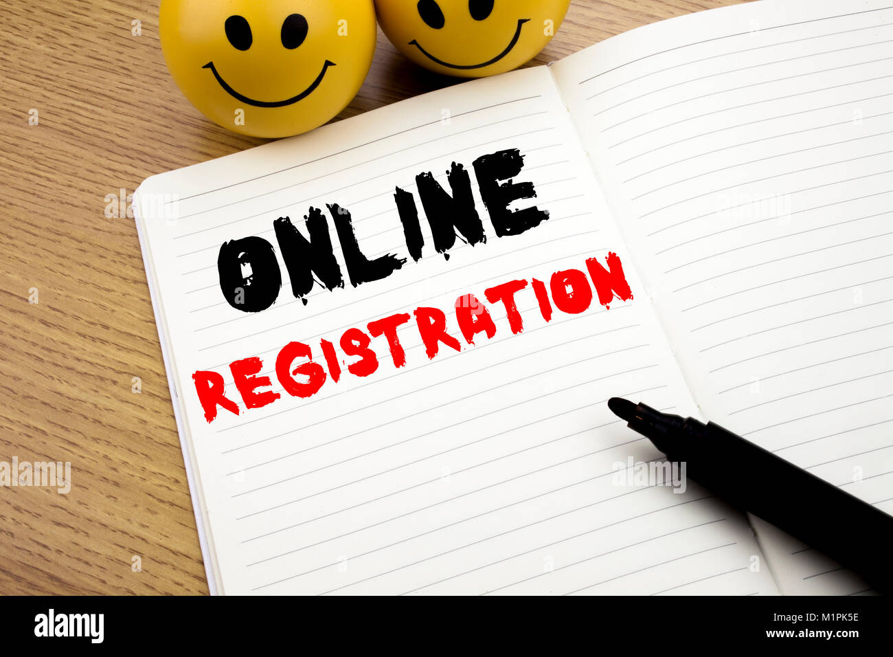 Handwritten text caption showing Online Registration. Business concept ...