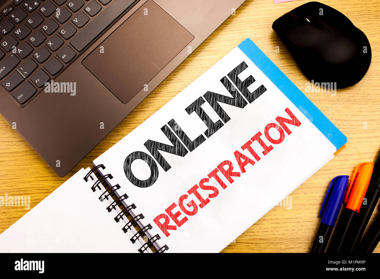 Handwritten text caption showing Online Registration. Business concept ...