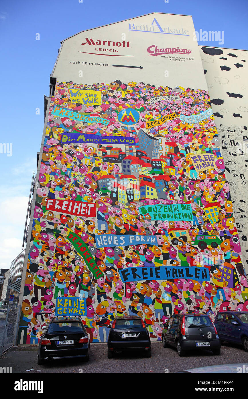 Colorful drawing of people with lettering on a house wall of the Marriott Hotels on the Brühl, Leipzig, Saxony, Germany, Bunte Zeichnung von Menschen  Stock Photo