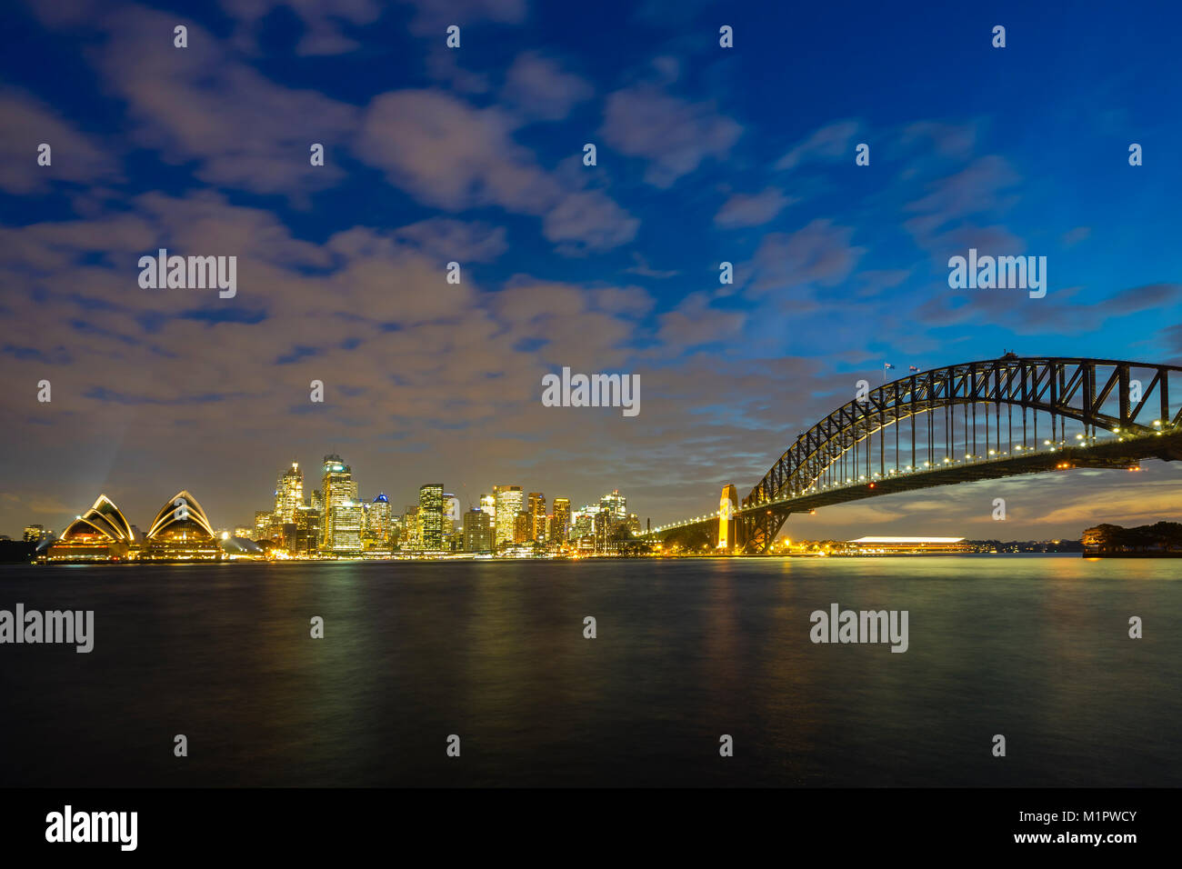 Sydney Opera House and CBD at night Stock Photo