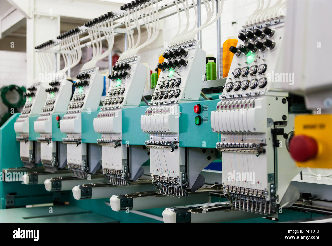 Textile industry factory in Gaborone , Botswana, Africa, industrial embroidery machines, Stock Photo