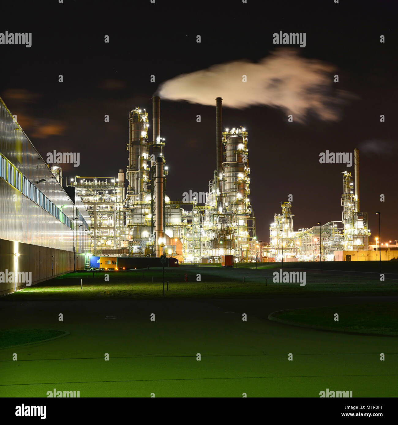 Chemical industry plant at night - building of a factory for the ...