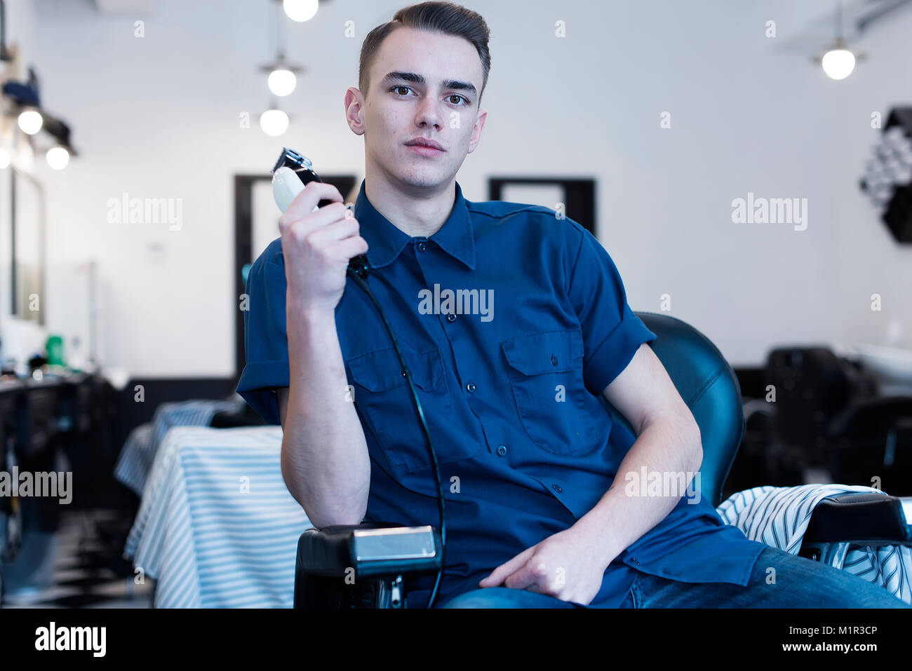Barber on the chair. Barber expects the client to sit in the chair