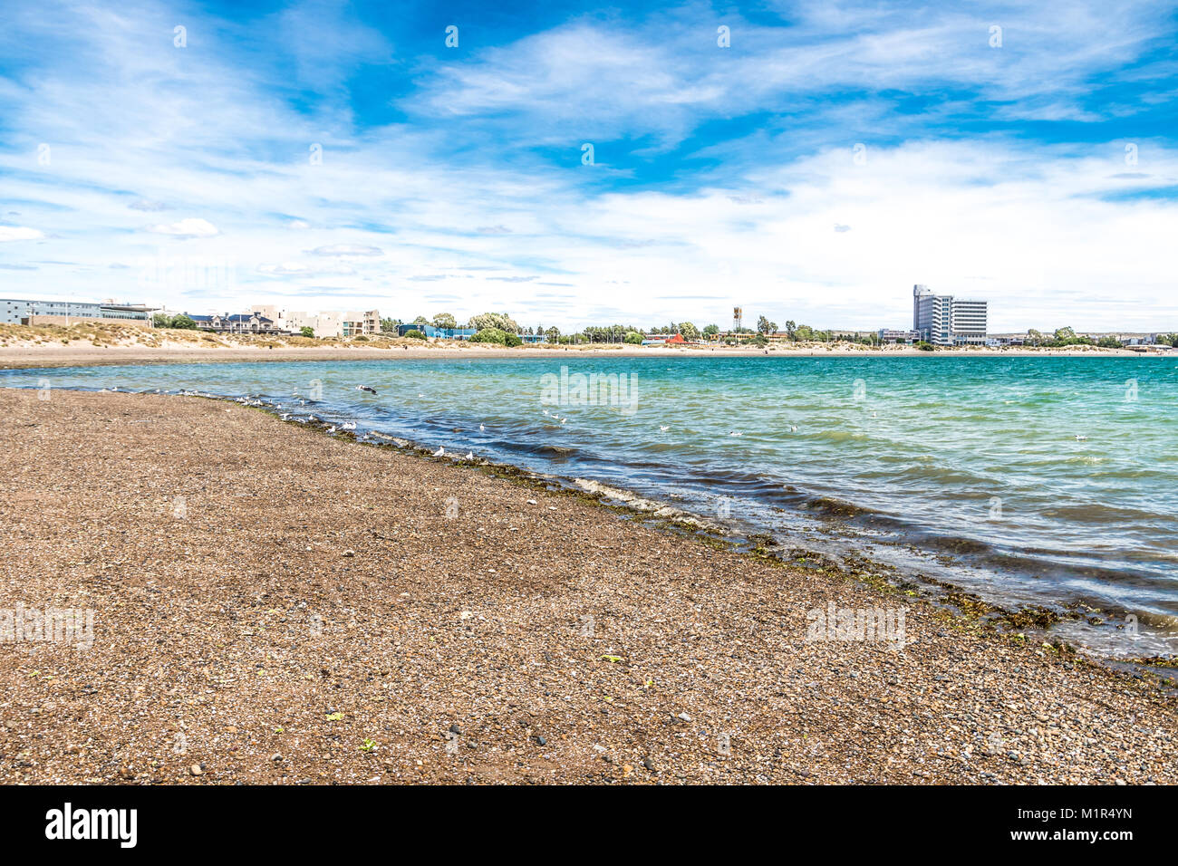 Puerto Madryn beach, sun, waves and sand, beautiful day Stock Photo