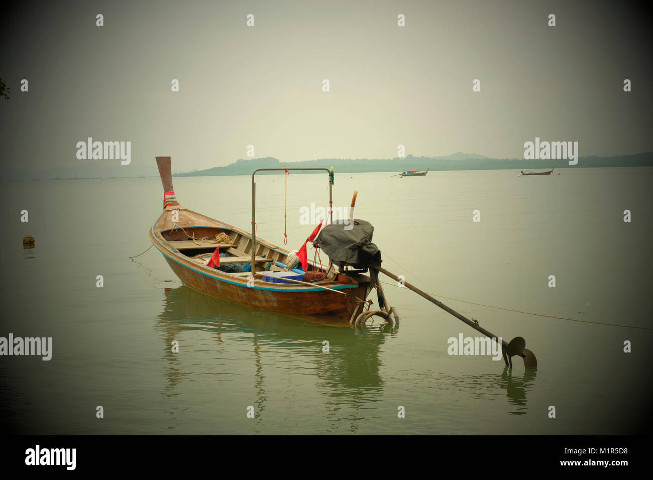 A long-tail fishing boat in koh Yao Noi, a Thai island in the Andaman Sea. 20-Jan-2018 Stock Photo