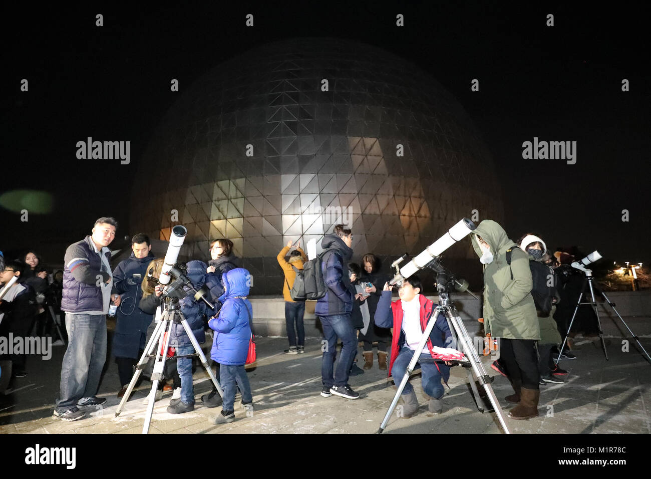 01st Feb, 2018. Super blue blood moon People watch the super blue blood ...