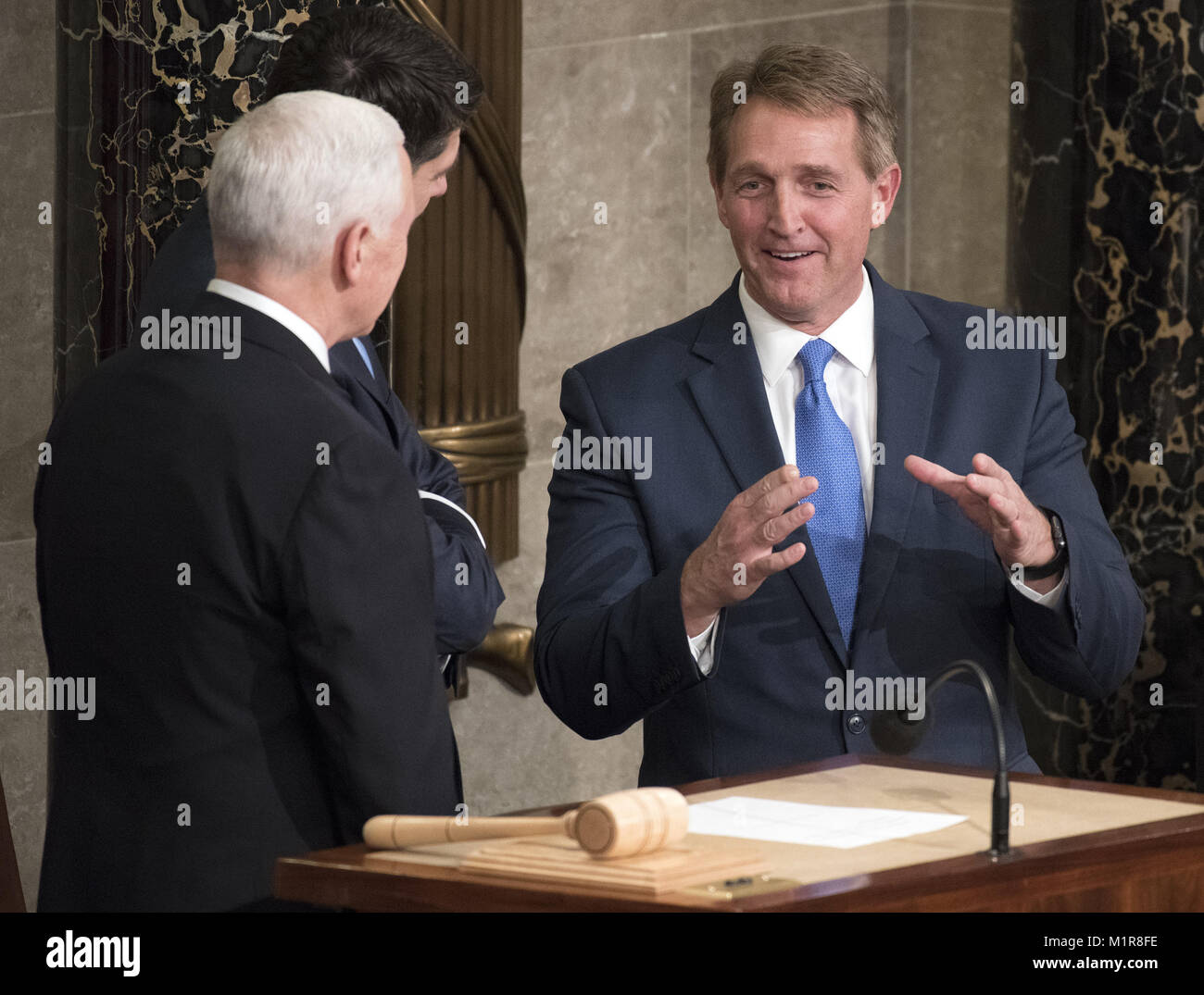 January 30, 2018 - Washington, District of Columbia, United States of America - United States Senator Jeff Flake (Republican of Arizona), right, has a conversation with US Vice President Mike Pence and Speaker of the United States House of Representatives Paul Ryan (Republican of Wisconsin) on the rostrum prior to the arrival of US President Donald J. Trump who will deliver his first State of the Union address to a joint session of the US Congress in the US House chamber in the US Capitol in Washington, DC on Tuesday, January 30, 2018.Credit: Ron Sachs/CNP (Credit Image: © Ron Sachs/CNP via Stock Photo