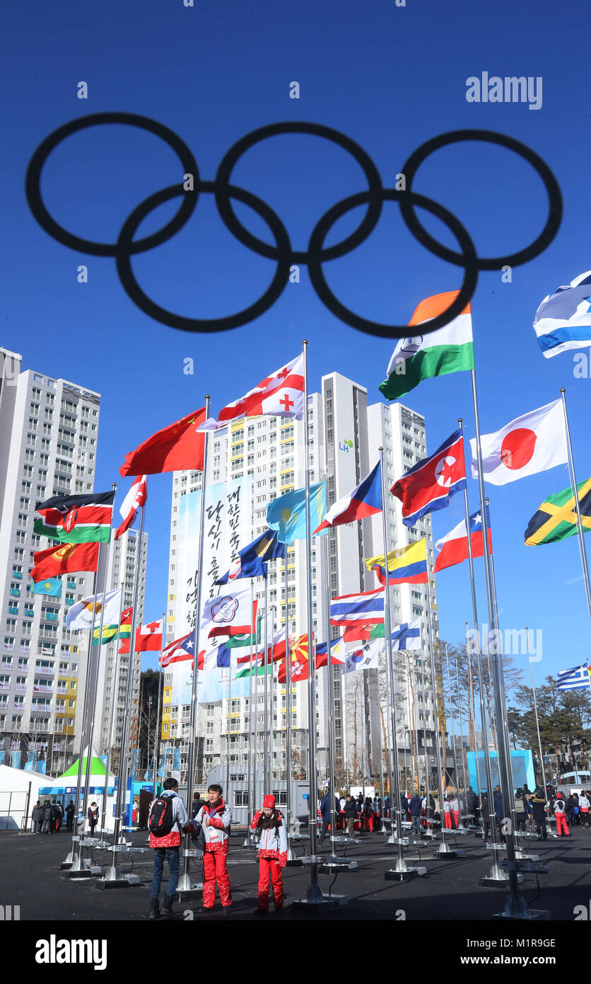01st Feb, 2018. Olympic athletes' village opens The flags of nations ...