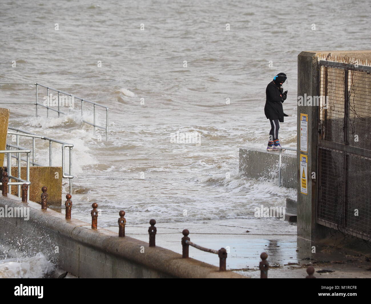 Sheerness, Kent, UK. 1st Feb, 2018. UK Weather a young woman takes a