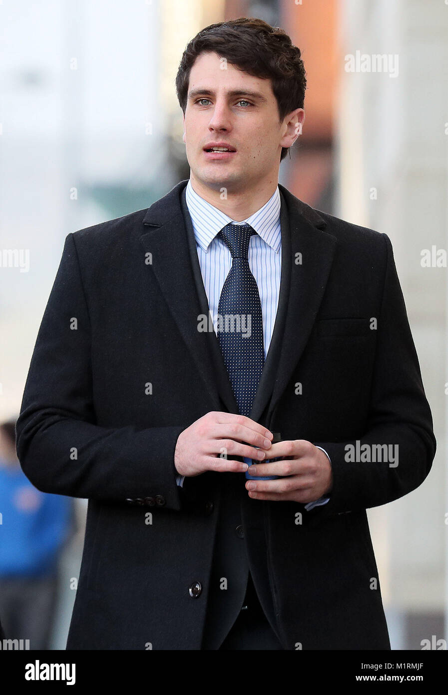 Blane McIlroy arrives at Belfast Crown Court where he is on trial accused of one count of exposure, in connection with an incident in which two Ireland and Ulster Rugby stars are accused of raping a woman at a property in south Belfast in June 2016. Stock Photo