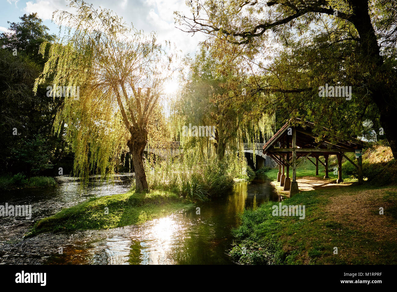 The lavoir in La Chapelle Faucher on the River Cole in the Dordogne France Stock Photo