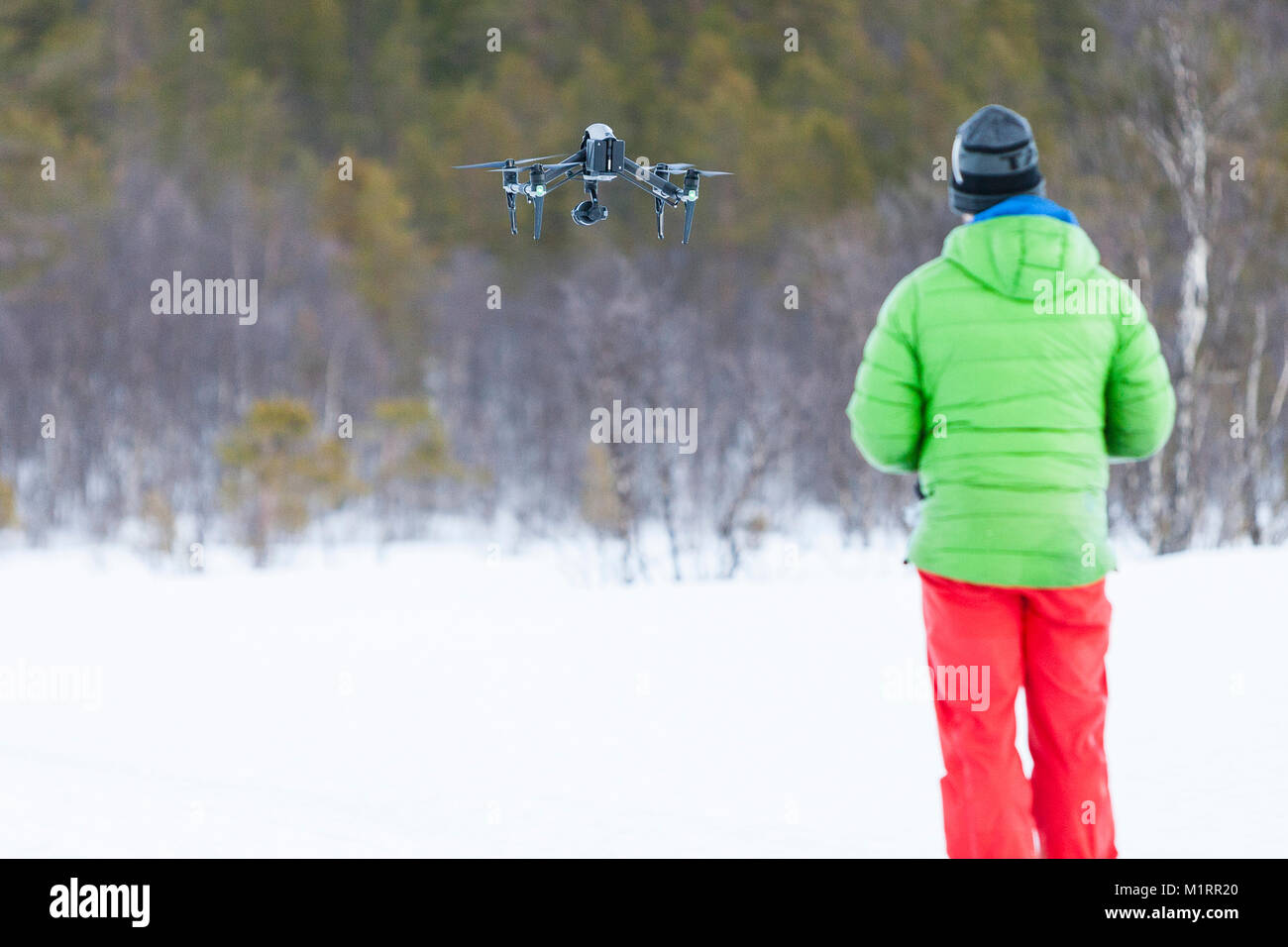 Overbygd, Norway. Drone op Eirik Heim flying drone. Stock Photo