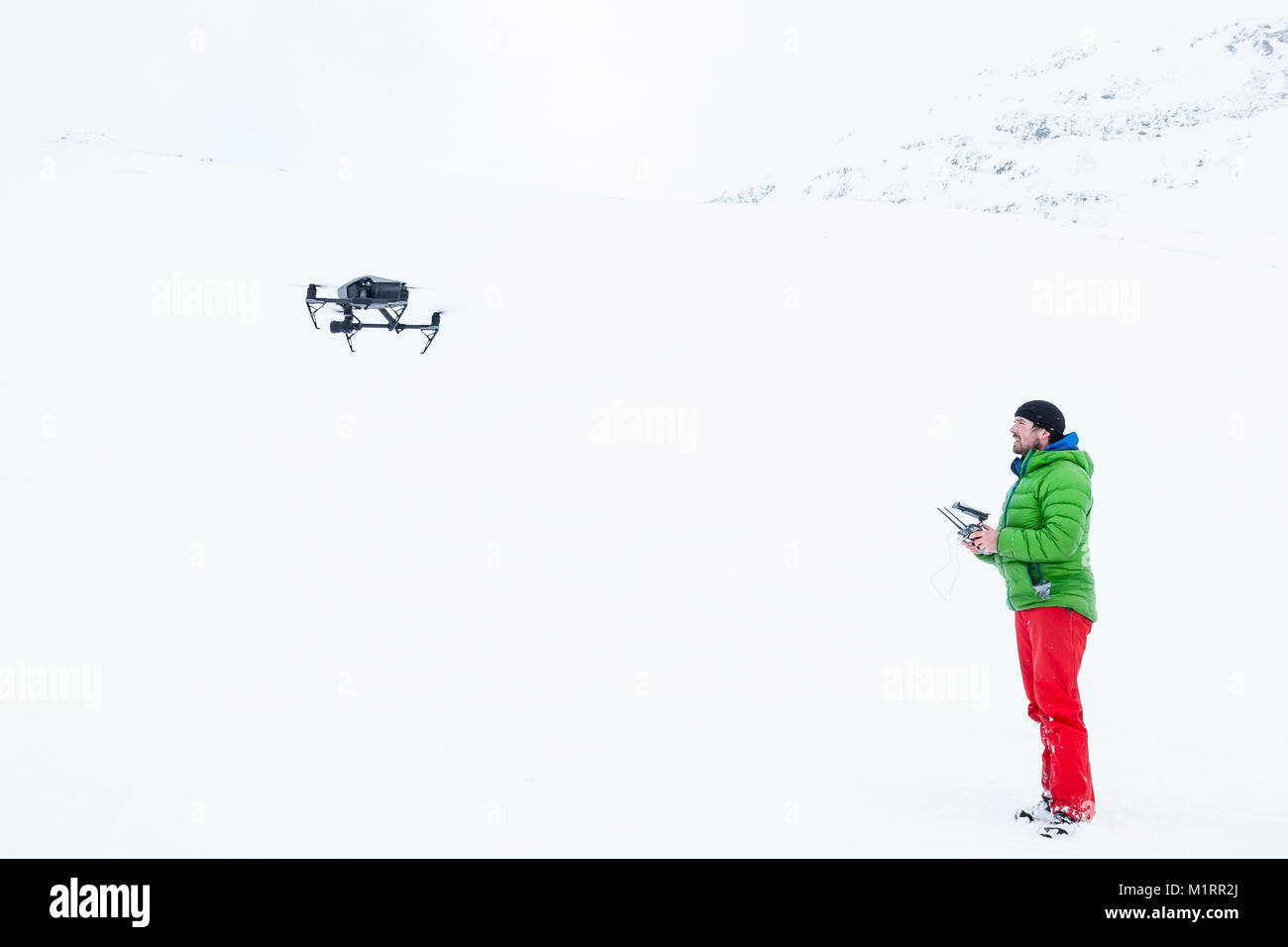 Skibotn, Norway. Drone op Eirik Heim flying drone. Stock Photo