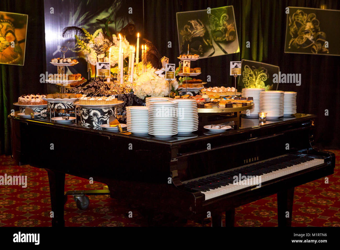 Grand piano as a giant desert tray for a buffet dinner, Naples, Florida,  USA Stock Photo - Alamy