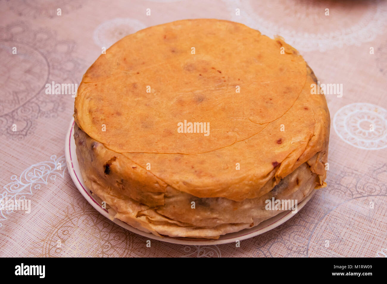 Shah pilaf. Khan pilaf in a pita. Traditional oriental dish . on tableware . Azerbaijan , Baku