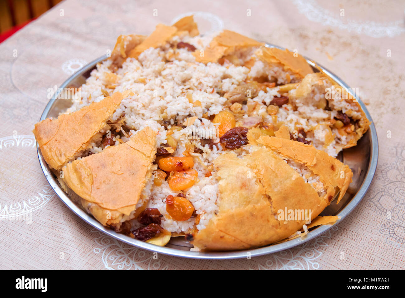 Shah pilaf. Khan pilaf in a pita. Traditional oriental dish . on tableware . Azerbaijan , Baku