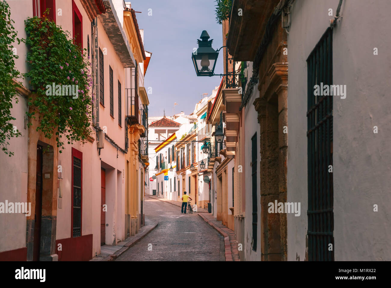 The sunny street in Cordoba, Spain Stock Photo