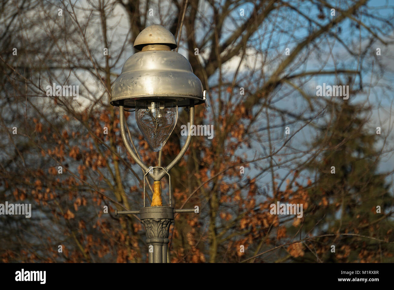 a gas lantern on Berlin streets at daytime in closeup Stock Photo