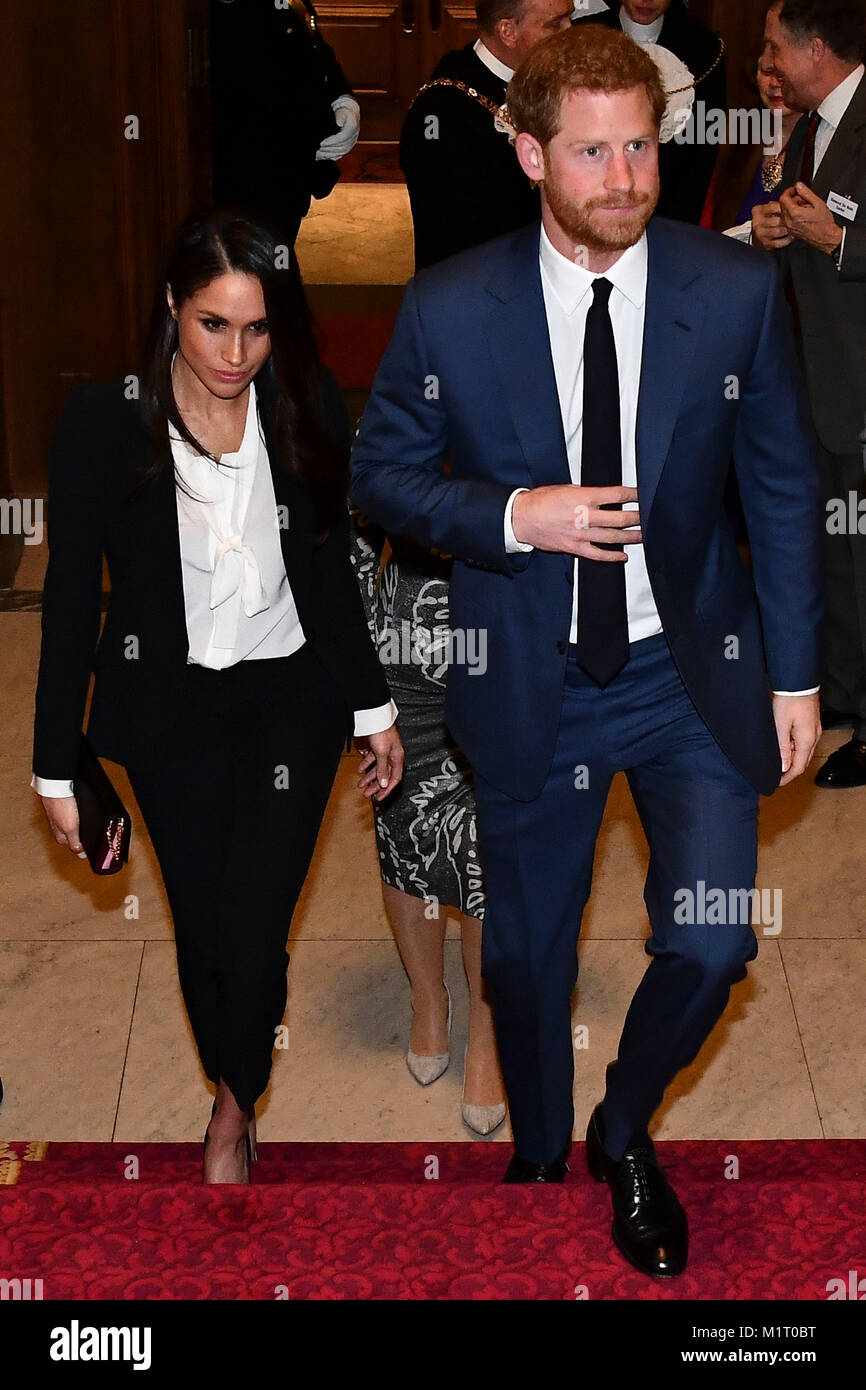 Prince Harry and Meghan Markle attend the annual Endeavour Fund Awards at Goldsmiths' Hall in London, to celebrate the achievements of wounded, injured and sick servicemen and women who have taken part in sporting and adventure challenges over the last year. Stock Photo