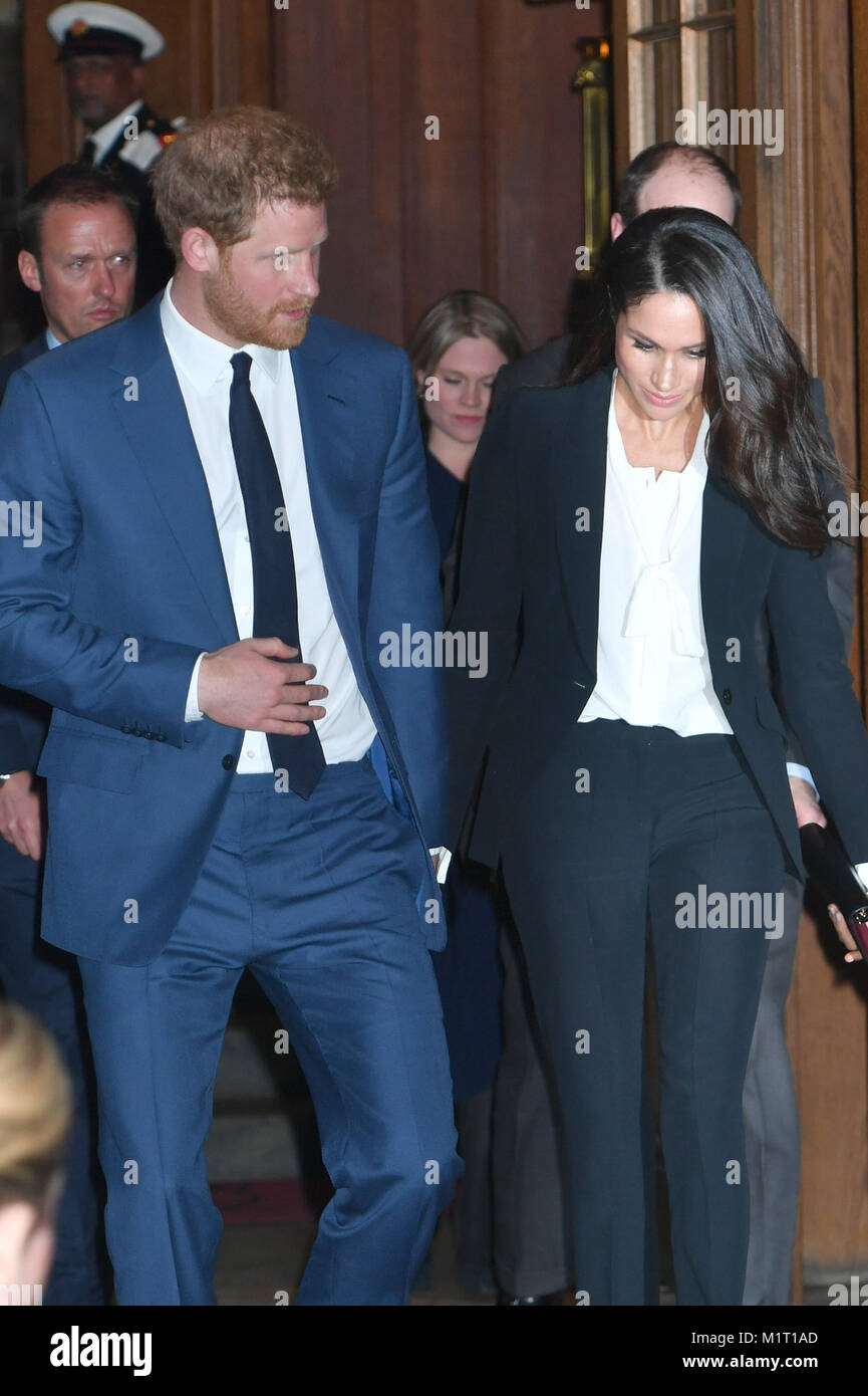 Prince Harry and Meghan Markle leave after attending the annual Endeavour Fund Awards at Goldsmiths' Hall in London, which celebrates the achievements of wounded, injured and sick servicemen and women who have taken part in sporting and adventure challenges over the last year. Stock Photo