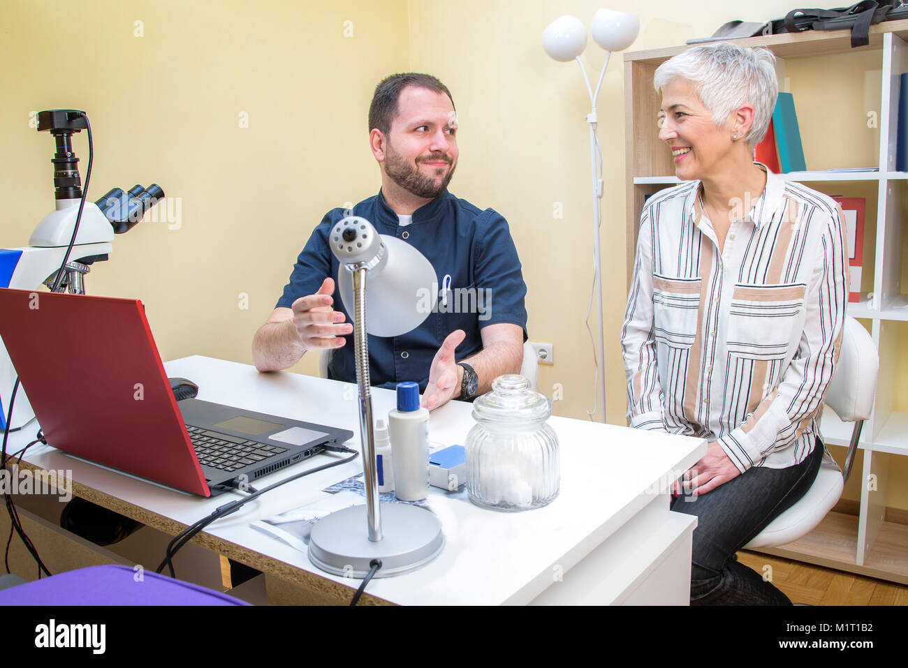 Elderly woman with a doctor, getting some health advice Stock Photo