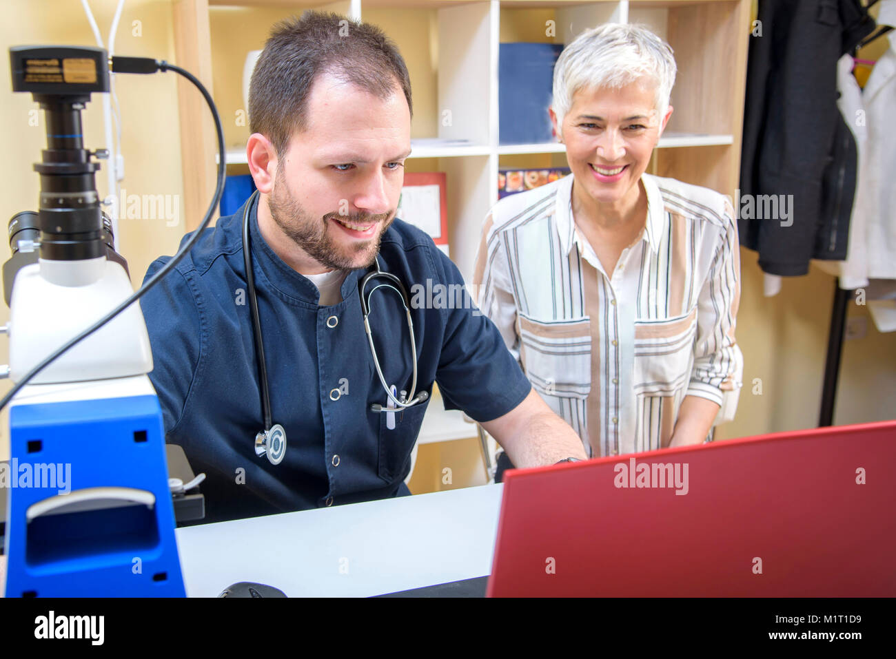 Elderly woman with a doctor, getting some health advice Stock Photo