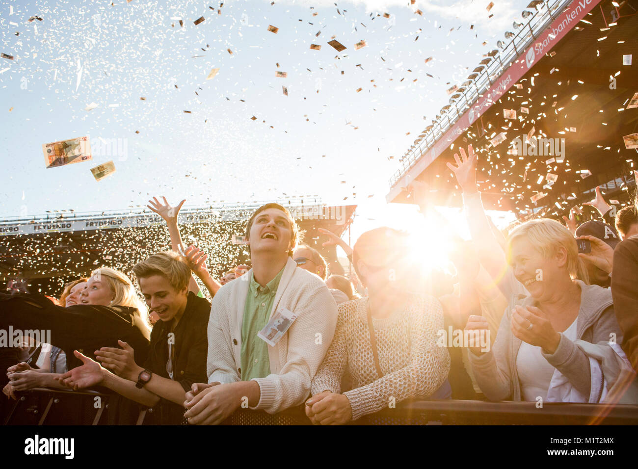Music fans attend a live concert with the English rock band Muse at Brann  Stadion. Norway, 19/07 2013 Stock Photo - Alamy