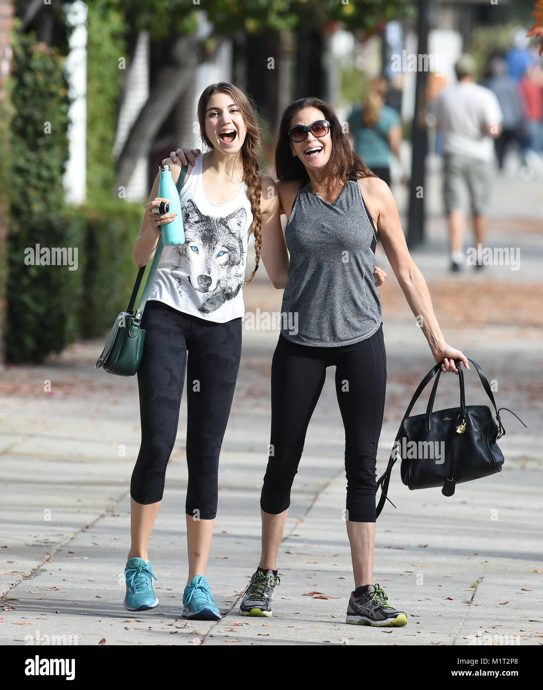 Teri Hatcher and her daughter Emerson Tenney leave a gym after working