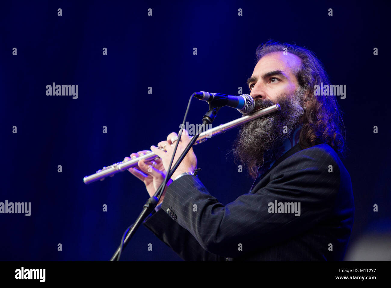 The Australian band Nick Cave and the Bad Seeds perform a live concert at the Norwegian music festival Bergenfest 2013. Here musician Warren Ellis is seen live on stage. Norway, 13/06 2013. Stock Photo