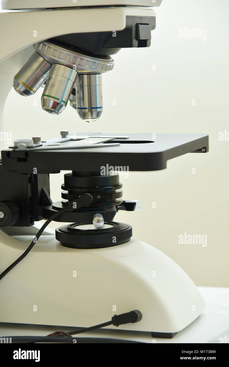 Microscopes Triple Science Triple specular microscope, clinic, hospital or laboratory Stock Photo ...
