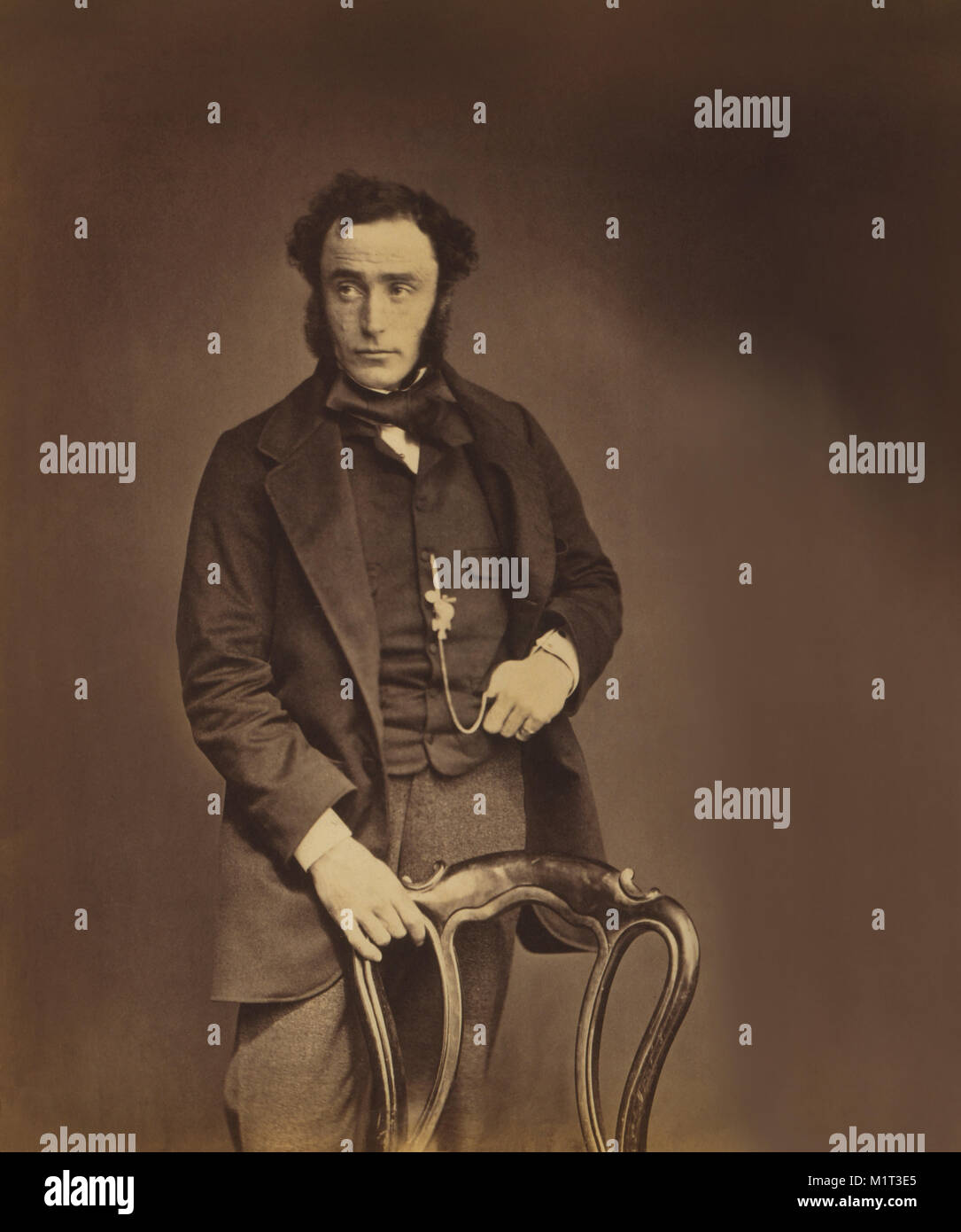 British Lieutenant-Colonel John Clarke Kennedy, 18th (Royal Irish) Regiment of Foot, Three-Quarter Length Portrait in Suit Standing Behind Chair, Crimean War, Crimea, Ukraine, by Roger Fenton, 1855 Stock Photo