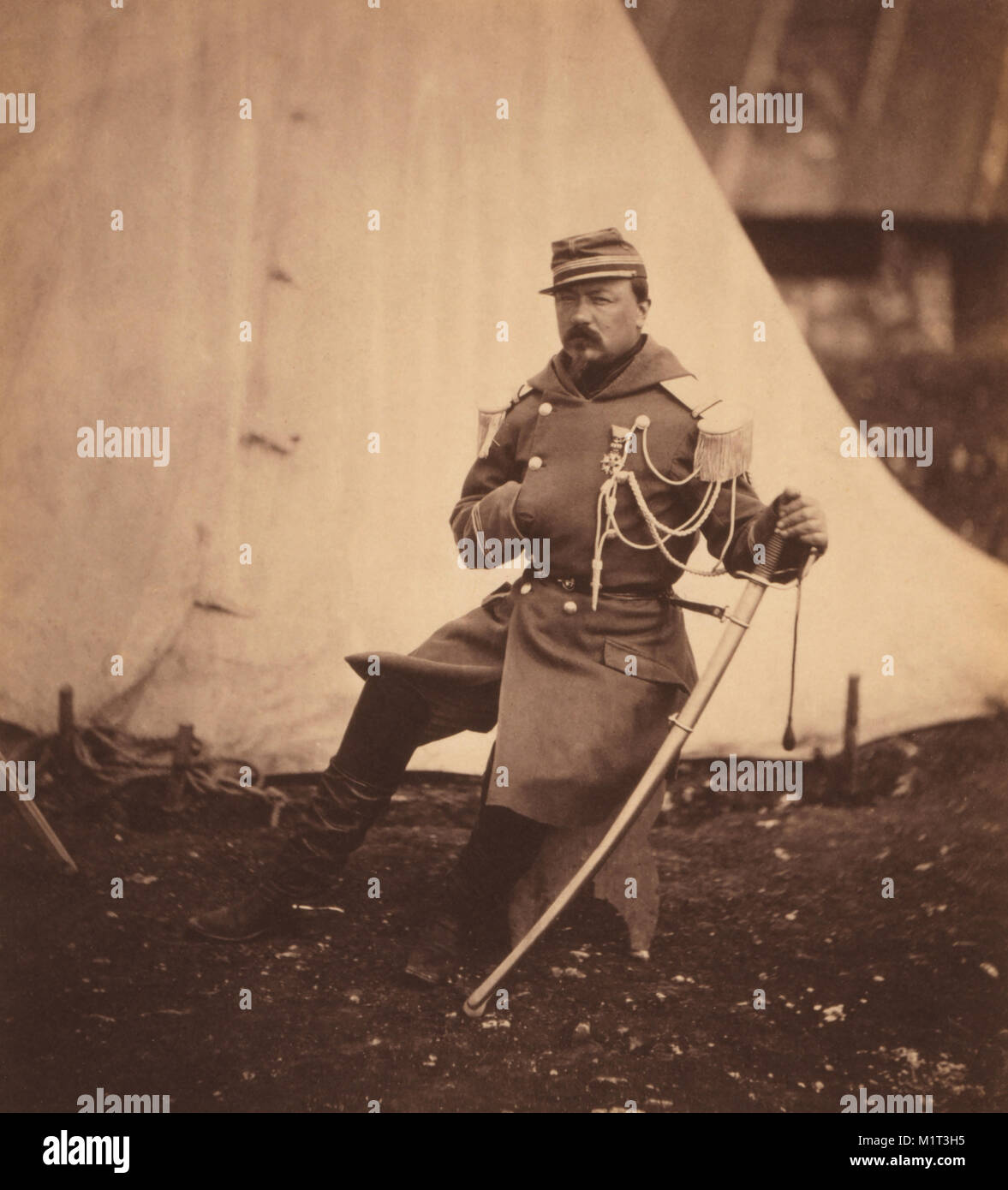 French Provost Marshal of the Division of General Bosquet, Full-Length Seated Portrait Wearing Uniform with One Hand Placed inside his Coat, Crimean War, Crimea, Ukraine, by Roger Fenton, 1855 Stock Photo