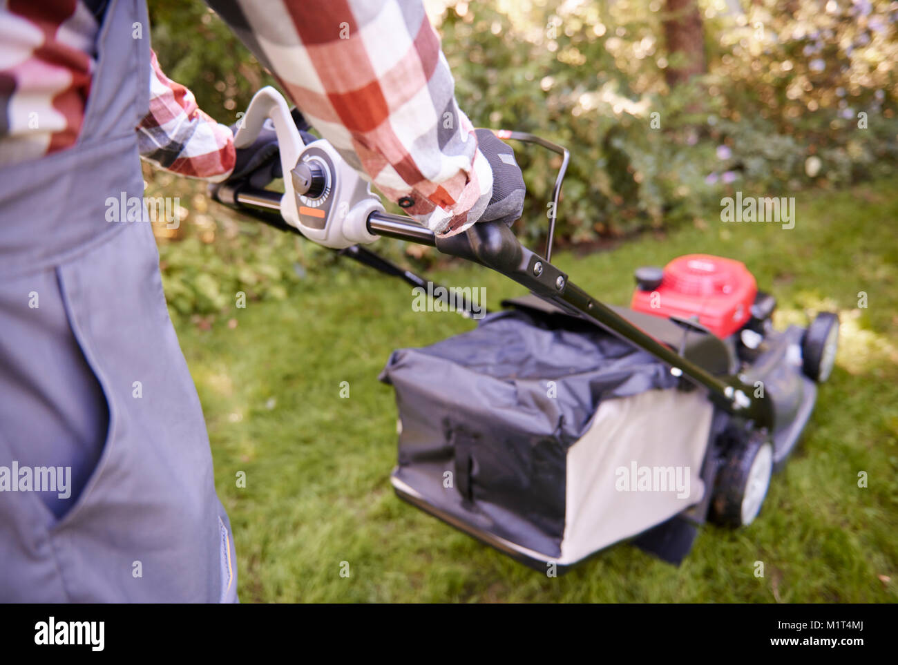Tool for cutting grass hi-res stock photography and images - Alamy