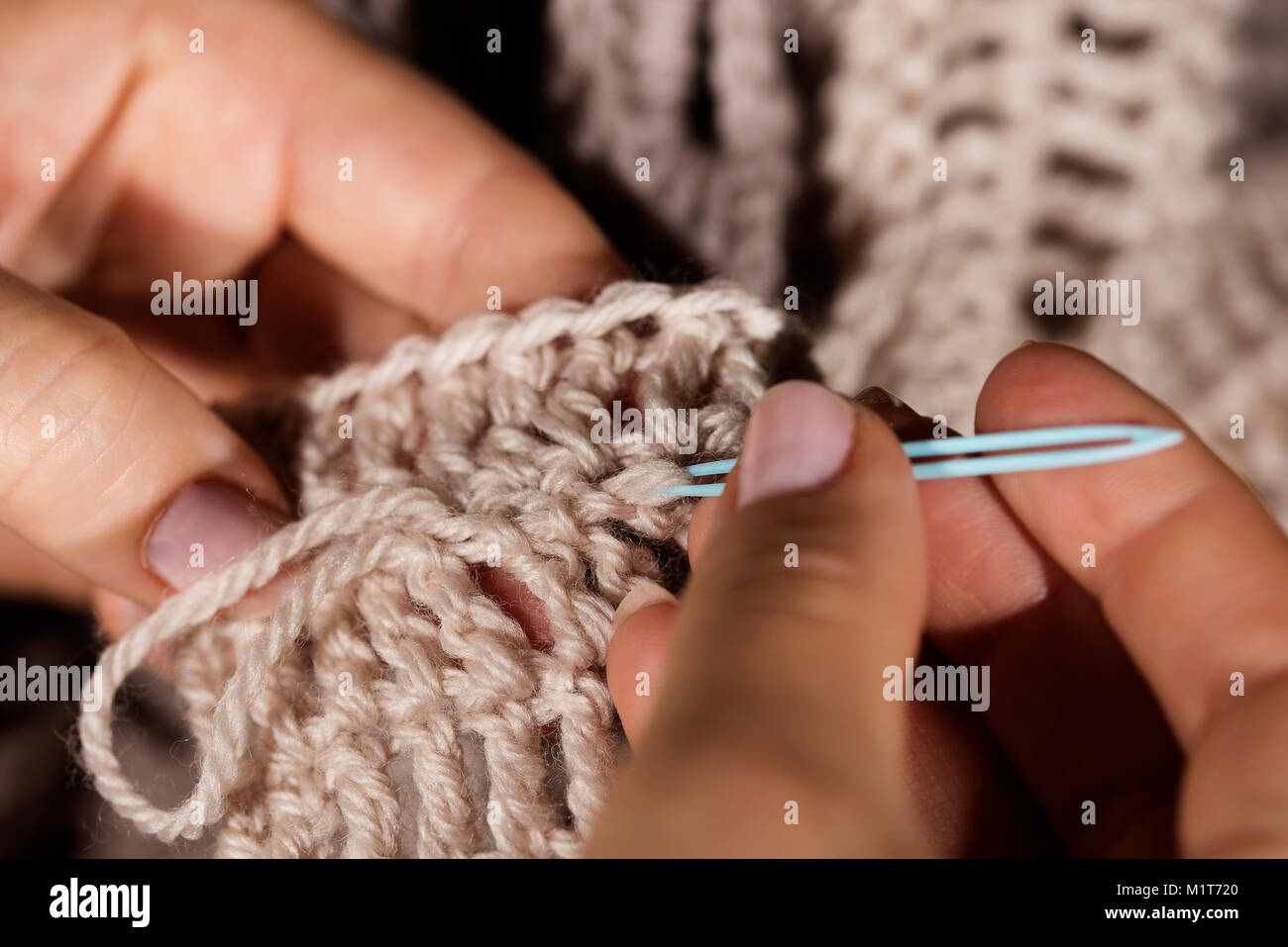 Weaving in yarn ends Stock Photo Alamy