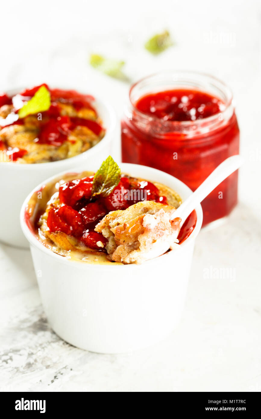 Bread pudding with strawberry jam Stock Photo Alamy